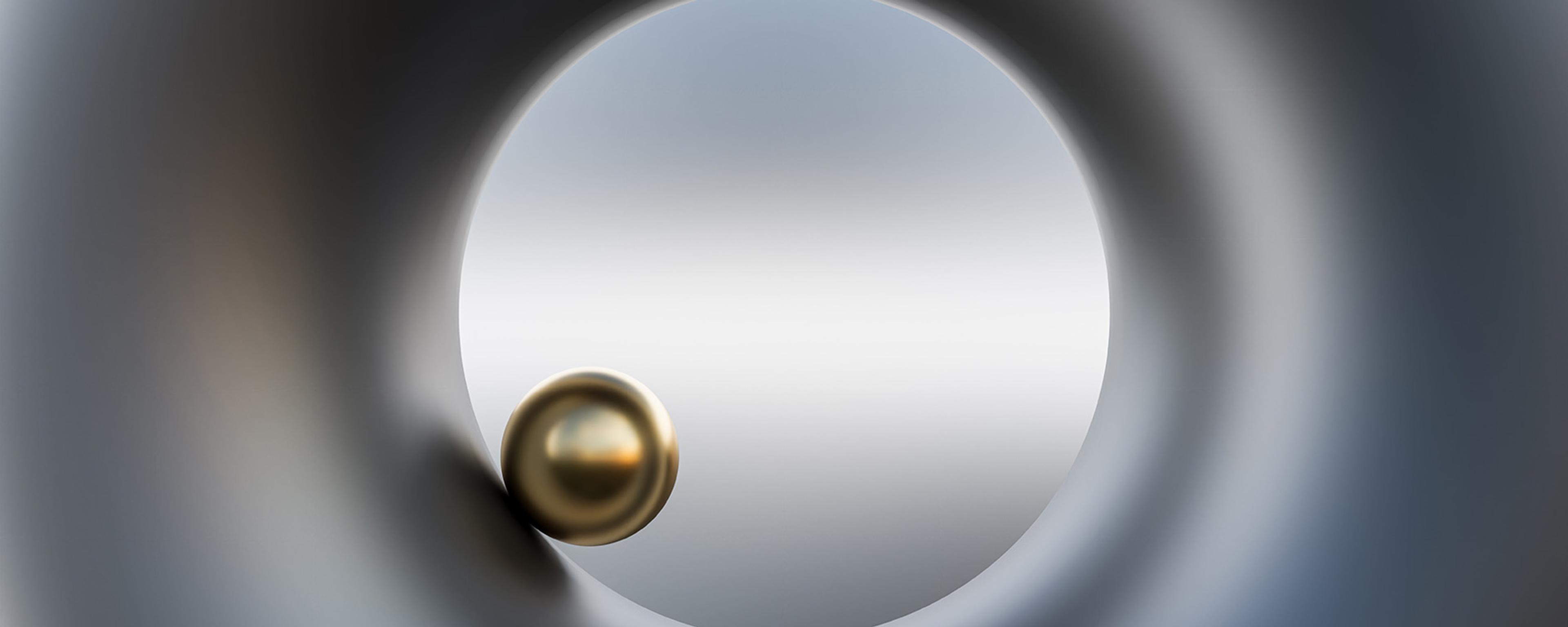 Abstract image featuring a metallic sphere inside a grey circular tunnel, viewed towards a blurred gradient background.